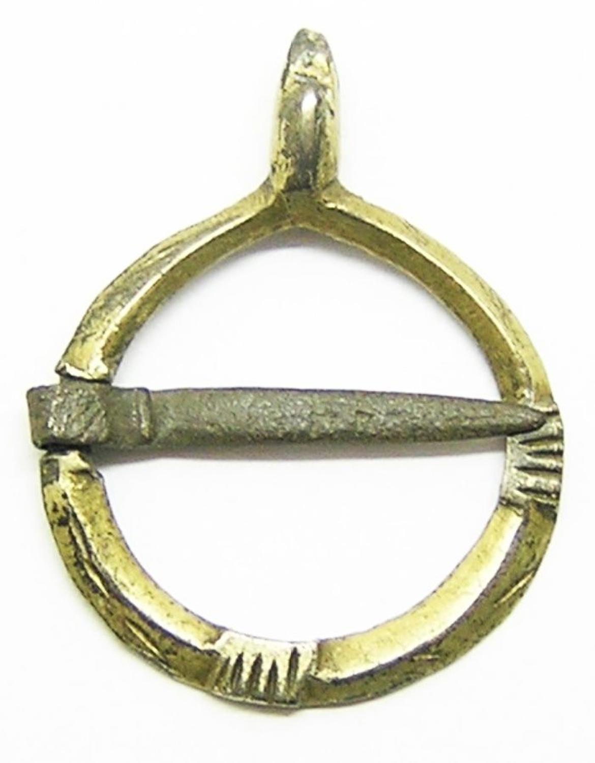 Medieval silver-gilt ring brooch clasped hands design